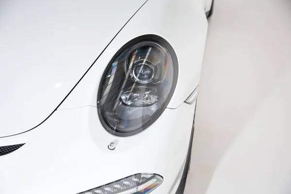 Closeup Headlight White Luxury Car Lights Grey Background — Stock Photo, Image