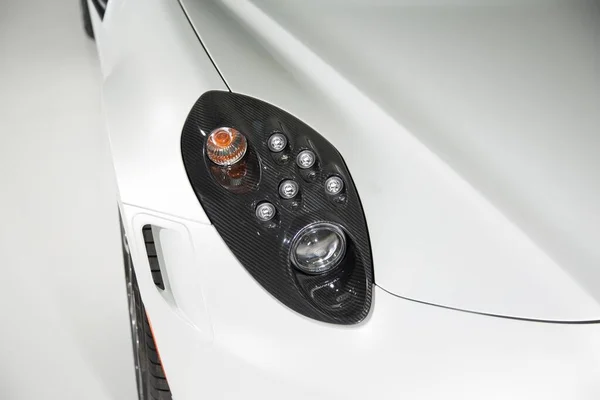 Close Carbon Fibre Headlight White Sports Car — Stock Photo, Image