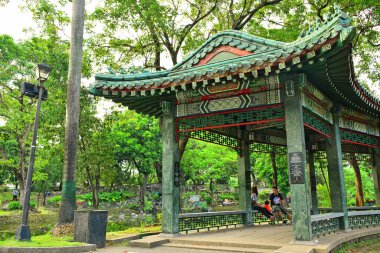 MANILA, PH - DEC. 29: Chinese Garden pavilion inside Rizal Park on December 29, 2016 in Roxas Boulevard, Manila. Rizal Park is one of the major tourist attractions and favorite leisure spot of Manila.