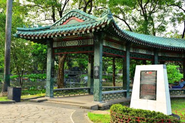 MANILA, PH - DEC. 29: Chinese Garden pavilion inside Rizal Park on December 29, 2016 in Roxas Boulevard, Manila. Rizal Park is one of the major tourist attractions and favorite leisure spot of Manila.