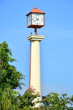 BANGKOK, TH - DEC 13: Clock tower at Dusit Zoo on December 13, 2016 in Khao Din Park, Bangkok, Thailand. Dusit Zoo is the oldest zoo in Bangkok, Thailand.