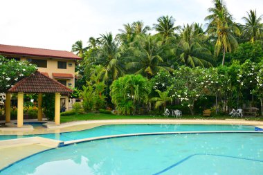 Negros Oriental, Ph-27 Ağustos 2016: 27 Ağustos 2016 tarihinde Filipinler 'in Dauin kentinde özel konutlar için Vip Resort yüzme havuzu. Özel Konut Vip Resort 'u 15 km uzaklıkta. Dumaguete şehrinden.
