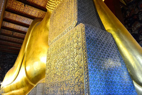 BANGKOK, TH - DEC. 12: Reclining Buddha art detail at Wat Pho on December 12, 2016 in Bangkok, Thailand. Wat Pho is a Buddhist temple complex in the Phra Nakhon District, Bangkok, Thailand.