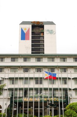 1 Ekim 2011 'de Manila Körfezi, Manila' da Manila Otel Cephesi 'nde. Manila Hotel, Filipinler 'de 1909 yılında inşa edilen 570 odalı ve en eski otelden oluşan 5 yıldızlı bir oteldir..