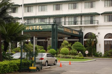 1 Ekim 2011 'de Manila Körfezi, Manila' da Manila Otel Cephesi 'nde. Manila Hotel, Filipinler 'de 1909 yılında inşa edilen 570 odalı ve en eski otelden oluşan 5 yıldızlı bir oteldir..
