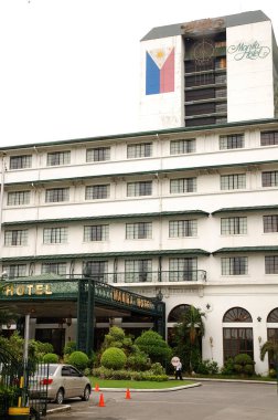 1 Ekim 2011 'de Manila Körfezi, Manila' da Manila Otel Cephesi 'nde. Manila Hotel, Filipinler 'de 1909 yılında inşa edilen 570 odalı ve en eski otelden oluşan 5 yıldızlı bir oteldir..