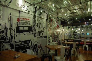 29 Aralık 2018 'de Manila, Filipinler' de Four Fingers restoranının içi. Four Fingers, Avustralya ve Güneydoğu Asya 'da şubeleri olan bir fast food zinciri..