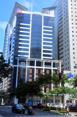 1 Ekim 2016 'da Bonifacio Global City, Taguig, Filipinler' de gökdelen bina cephesi. Bonifacio Global City, Filipinler 'in Manila şehrinde yer alan bir şehirdir..