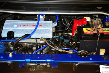 PASIG, PH - 13 Mayıs - Mitsubishi araba motoru Hot Import Nights fuarında 13 Mayıs 2018 tarihinde Pasig, Filipinler.