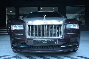 TAGUIG, PH - 13 Temmuz 2019 'da Bonifacio Global City, Taguig, Filipinler' de Rolls Royce arabası.