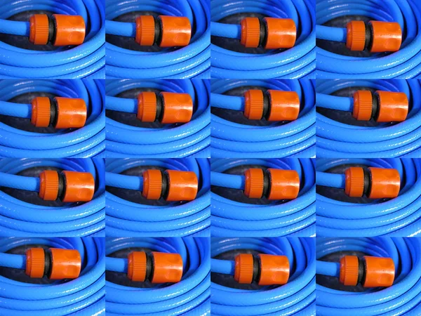 Sulama hortumundaki turuncu plastik geçiş başlığının birkaç resminin arkaplan dokusu görüntüsü (matris analogu). Ön form, atölye, atölye, dekoratif çerçeve için boş, tekstil baskısı için.