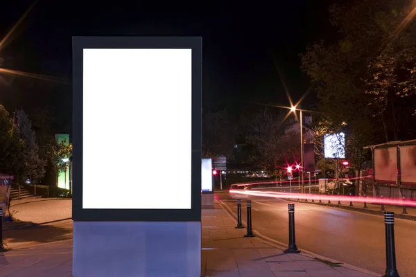 Billboard outdoor, advertising mockup, empty frame copy space for logo and text. Modern flat style signboard. Outdoor street banner night shot, long exposure.