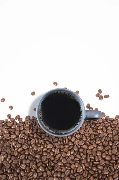 Filter coffee on grey cup, copy space on isolated coffee beans background. Top view style — Stock Photo, Image