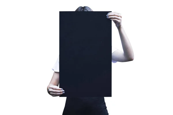 Woman holding a clipboard with both hands isolated background — 스톡 사진