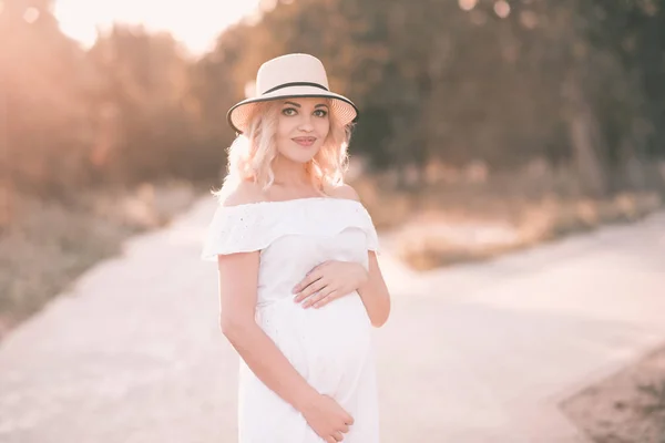 Smiling Pregnant Woman Wearing Stylish White Dress Posing Park Looking — Stock Photo, Image