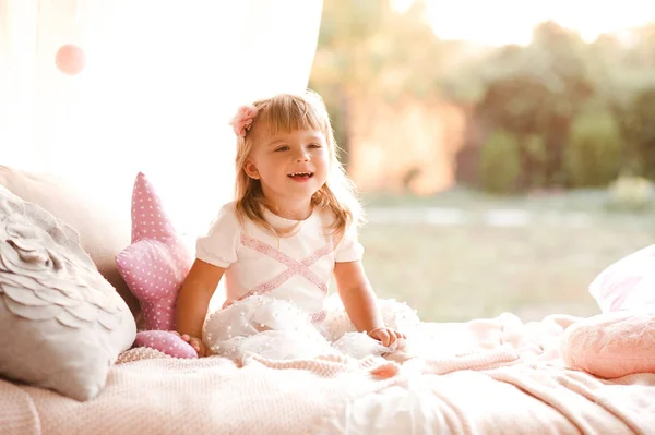 Laughing Baby Girl Year Old Wearing Princess Dress Sitting Bed — ストック写真