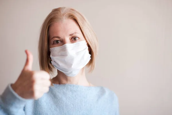 Happy Senior Woman Wearing Medical Mask Showing Thumb Looking Camera — Stock Photo, Image