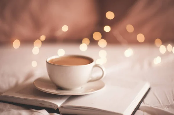 Fresh Cup Coffee Paper Book Glowing Lights Closeup Good Morning — Stock Photo, Image