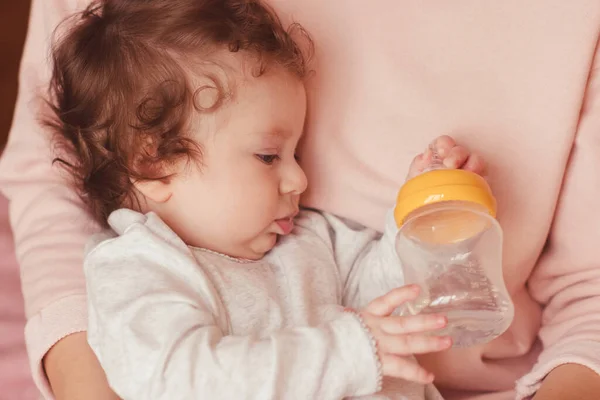 Baby Holing Bottle Fresh Water Mother Hands Closeup Good Morning — Stock Photo, Image