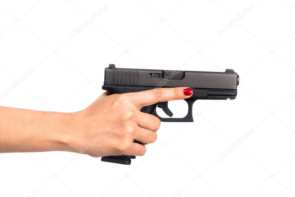 young woman asian girl holding a gun aiming at the gun white background