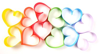 Bunch of multicolored paper hearts cutouts background
