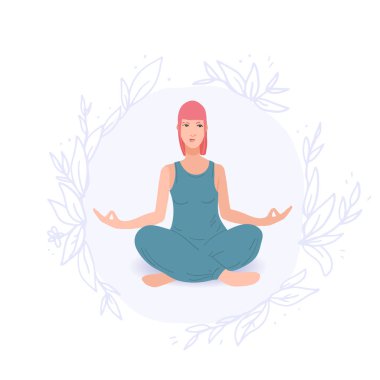 Yoga yapan genç ve güzel bir kadın..