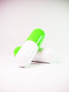 Beyaz arka planda 3 boyutlu gerçekçi tıbbi hap. Model tarzında kapsül. Tıp ve sağlık hizmetleri kavramı. Haplar tasarım şablonu, grafik için kapsüller, tasarım. Vektör illüstrasyonu