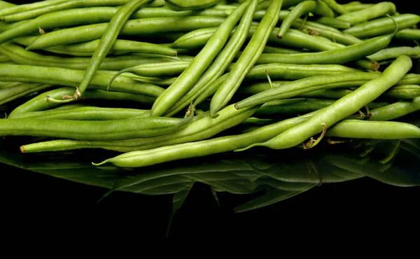 Green beans on black background,healthy food — Stock Photo, Image