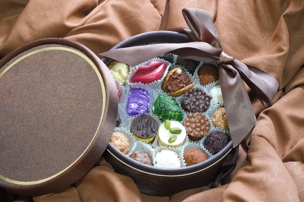 Beautiful fancy chocolate in the brown gift box — Stock Photo, Image