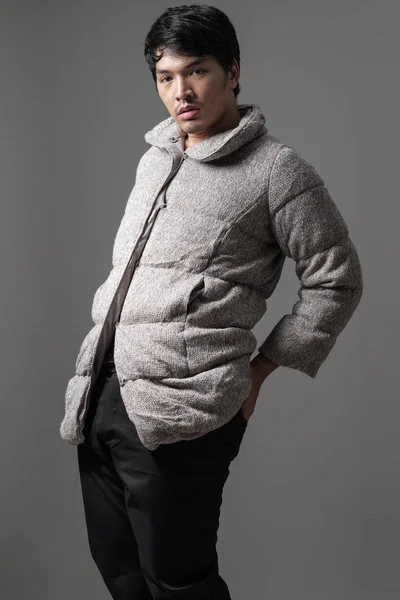 Portrait of asian man in gray knitting coat - Fashion and style — Stock Photo, Image