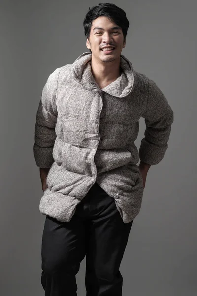 Portrait of asian man in gray knitting coat - Fashion and style — Stok Foto