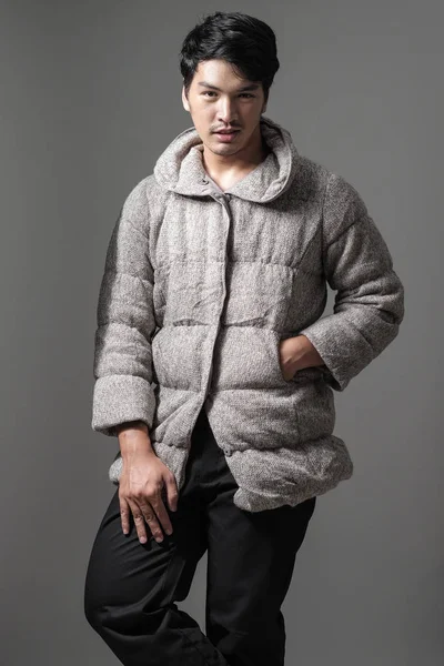 Portrait of asian man in gray knitting coat - Fashion and style — Stock Photo, Image