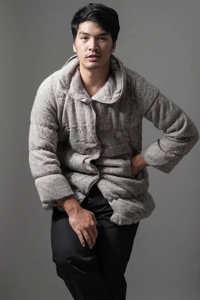 Portrait of asian man in gray knitting coat - Fashion and style — Stock Photo, Image