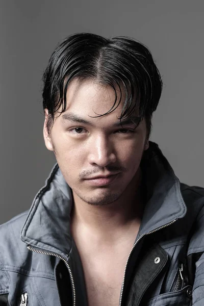 Portrait of Asian man in the jacket - Head shot