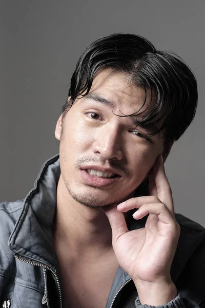 Portrait of Asian man in the jacket - Head shot — Stock Photo, Image