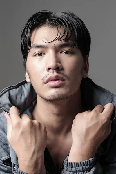 Portrait of Asian man in the jacket - Head shot — Stock Photo, Image