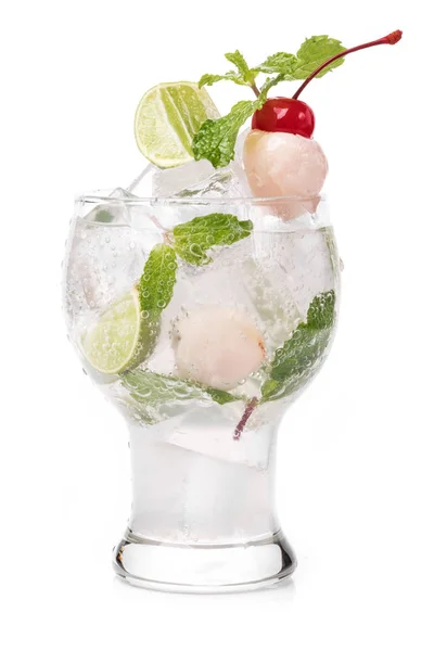 Lychee cocktail with mint leaves, lime and cherry decoration in white background — Stock Photo, Image