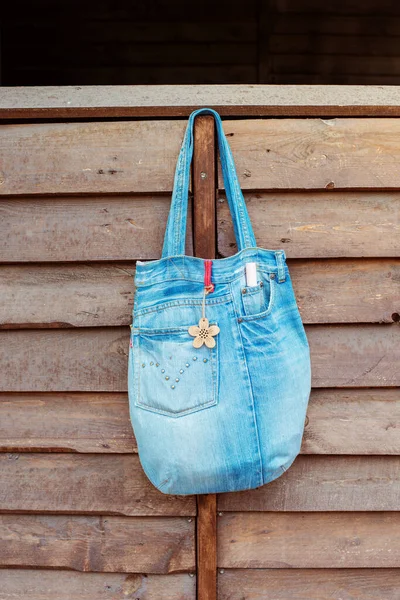 jeans bag, handmade, eco bag on wooden background