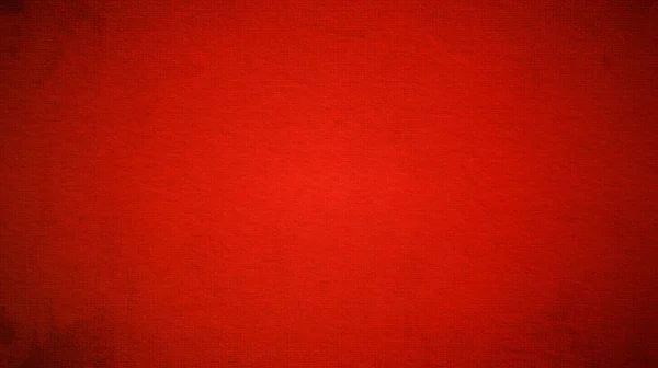 A sheet of bright red paper with light vignetting around the edges. Passionate red color. Saturated bright paint. Paper texture. Background for greeting card or page with the holiday St. Valentine. — Stock Photo, Image
