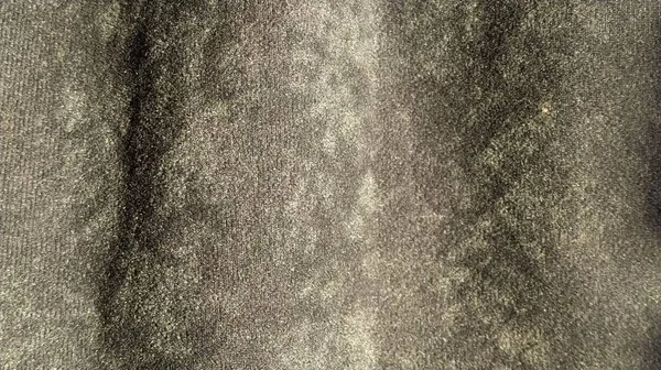 Close-up de veludo tecido grosso para cortinas. Cor azul-cinza. O material está pendurado em ondas. Amostra para decoração de casa. Pedaço de tecido de veludo . — Fotografia de Stock