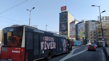 Belgrade, Serbia - January 24, 2020: Slavia Square in the center of Belgrade. Roundabout. Active traffic, cars, public transport, lights, road markings and bus. Hotel Slavia and modern buildings
