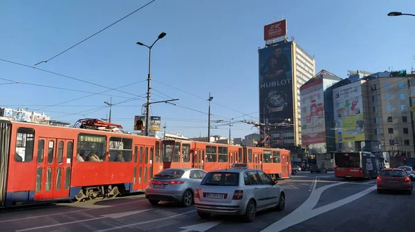 Belgrade, Serbia - January 24, 2020: Slavia Square in the center of Belgrade. Roundabout. Active traffic, cars, public transport, lights, road markings and tram. Hotel Slavia and modern buildings