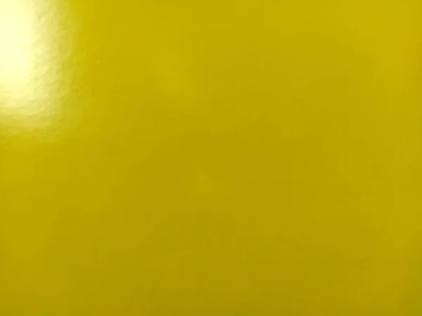 Krásné Jasně Žluté Pozadí Detailní Záběr Lesklého Reflexního Papíru Čistá — Stock fotografie