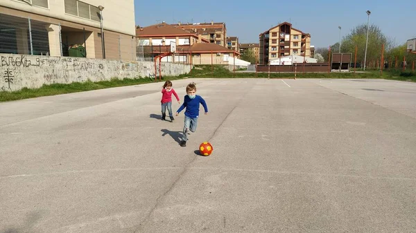Girl Boy Play Soccer Asphalt Sports Field Children Wear Protective — Stock Photo, Image