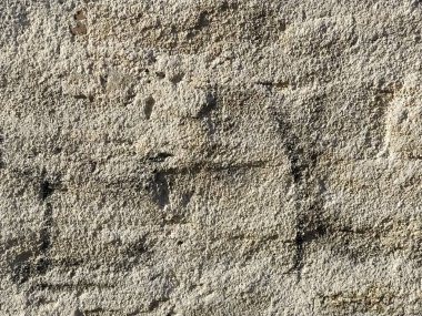 İnce bir alçı tabakasıyla kaplı eski tuğla duvar. Olaysız bir yüzey. Doku arkaplanı.