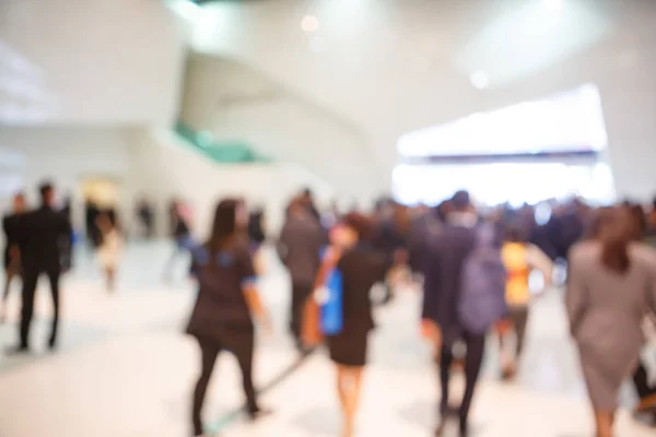 People in exhibition fair blurred — Stock Photo, Image