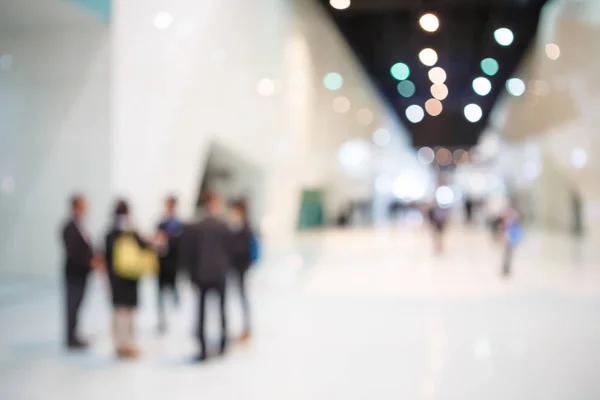 People in exhibition fair blurred — Stock Photo, Image