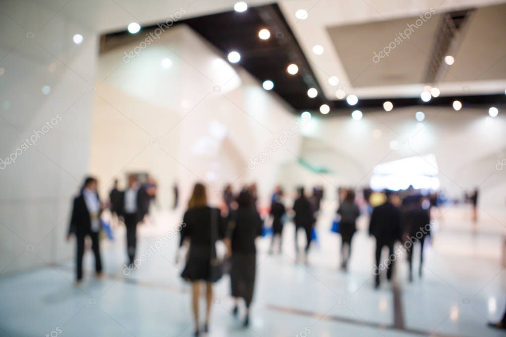 People in exhibition fair blurred 