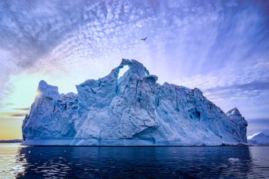 Greenland Ilulissat glaciers at ocean clipart