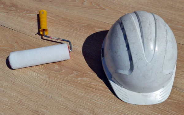 Construction Helmet Roller Lie Wooden Table — Stock Photo, Image